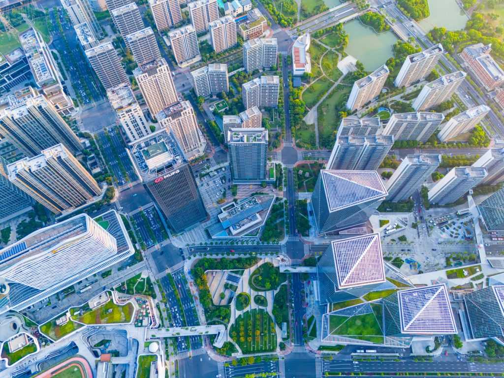 Aerial view of Shanghai Downtown skyline with green parks