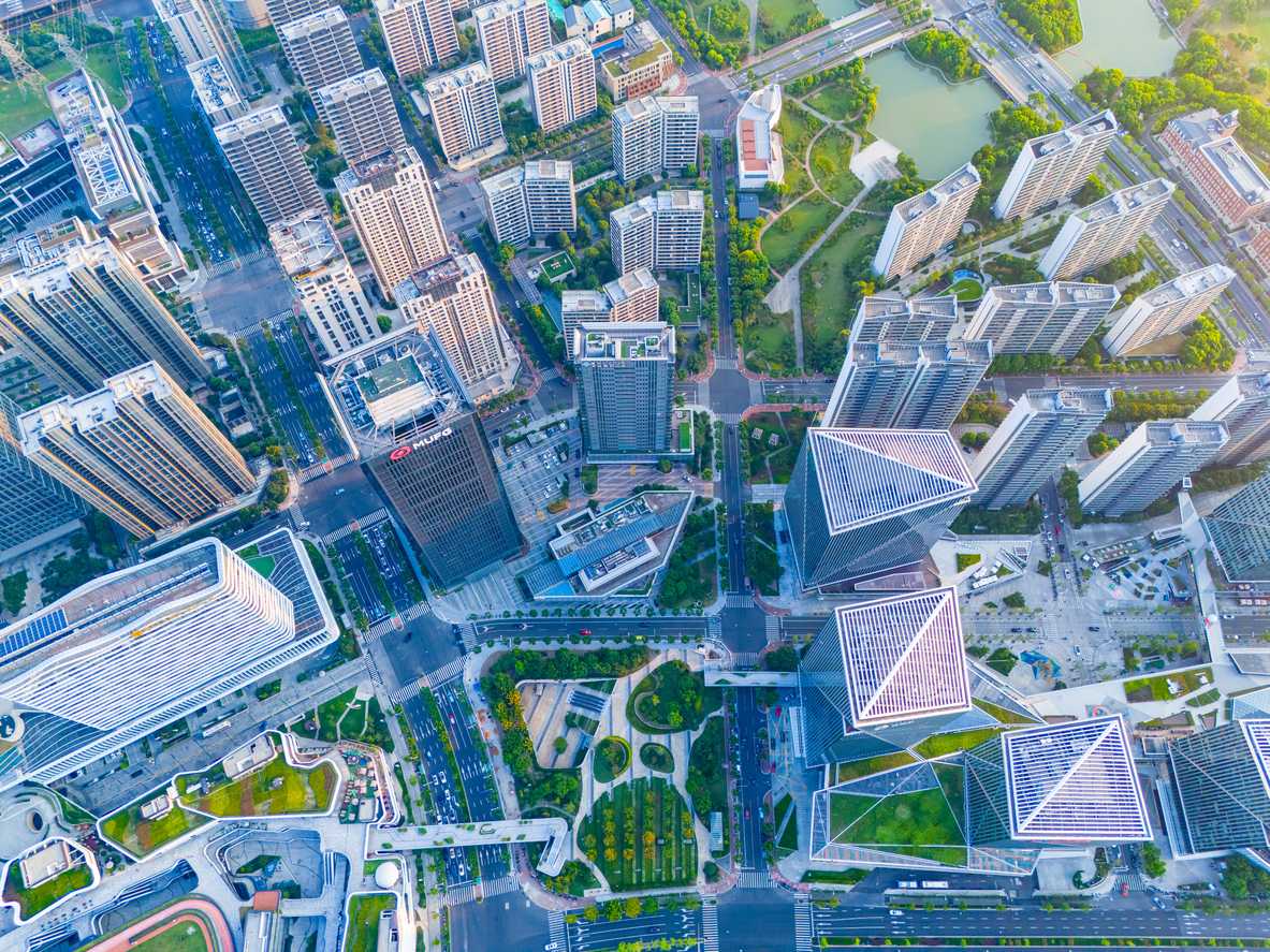 Aerial view of Shanghai Downtown skyline with green parks